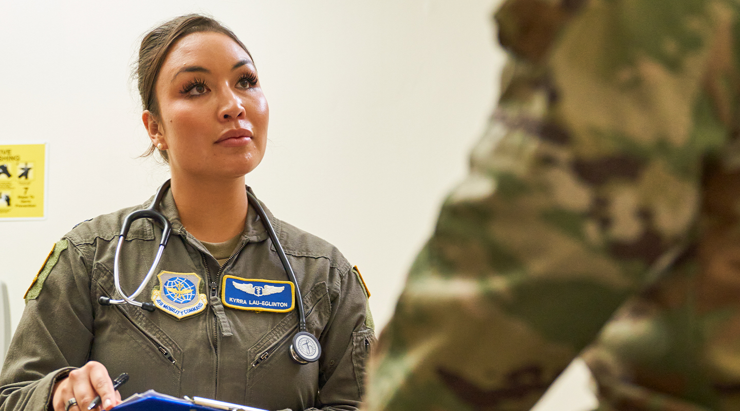 Aeromedical Physician listening to patient