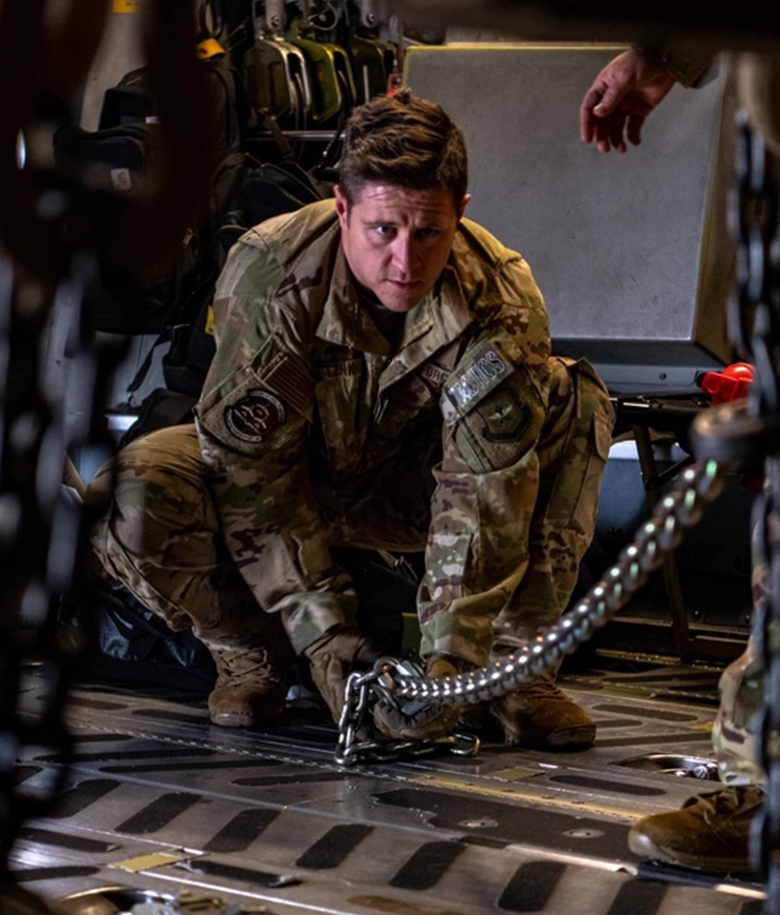 airmen working on aircraft