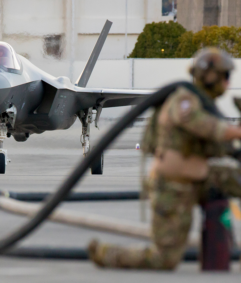 airmen working on equipment