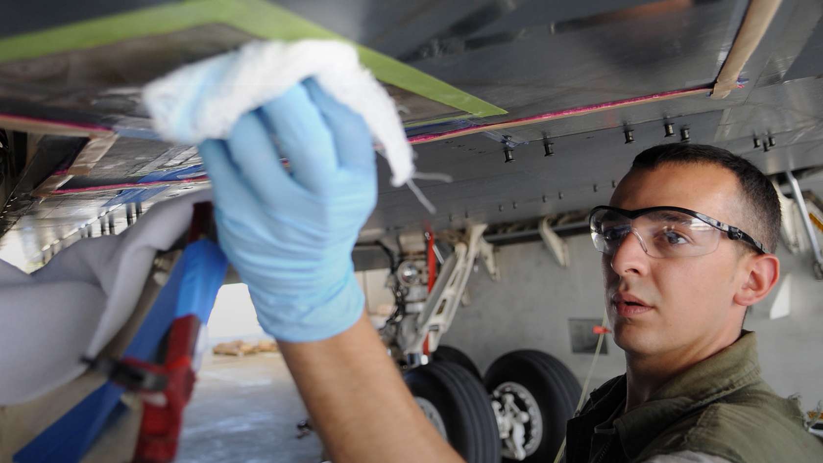 airman performing maintenance