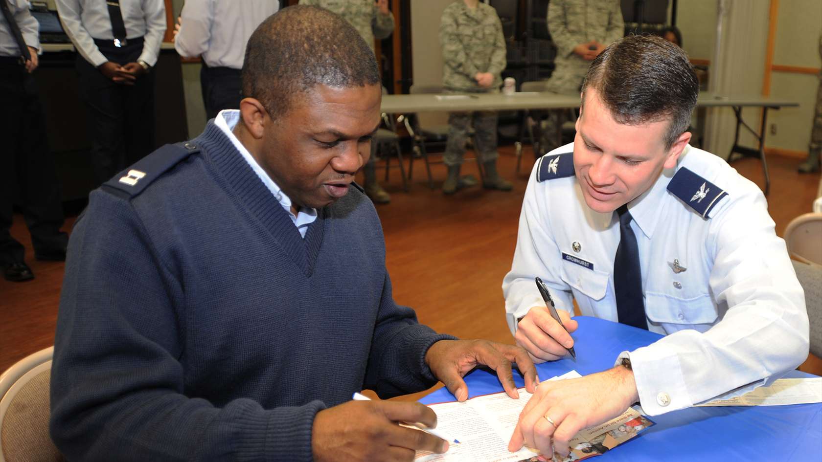 force support officer speaking to an airman
