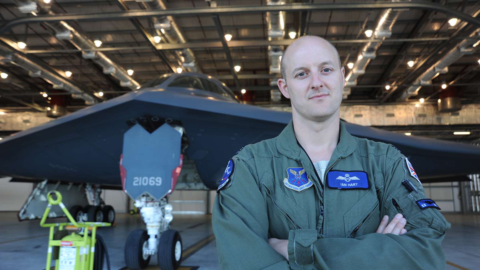 Special Missions Aviator in front of stealth bomber