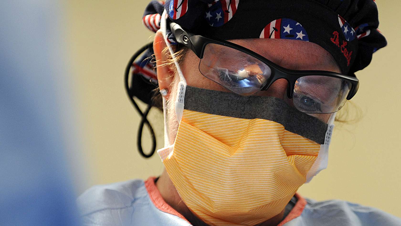 airman wearing protective glasses and mask