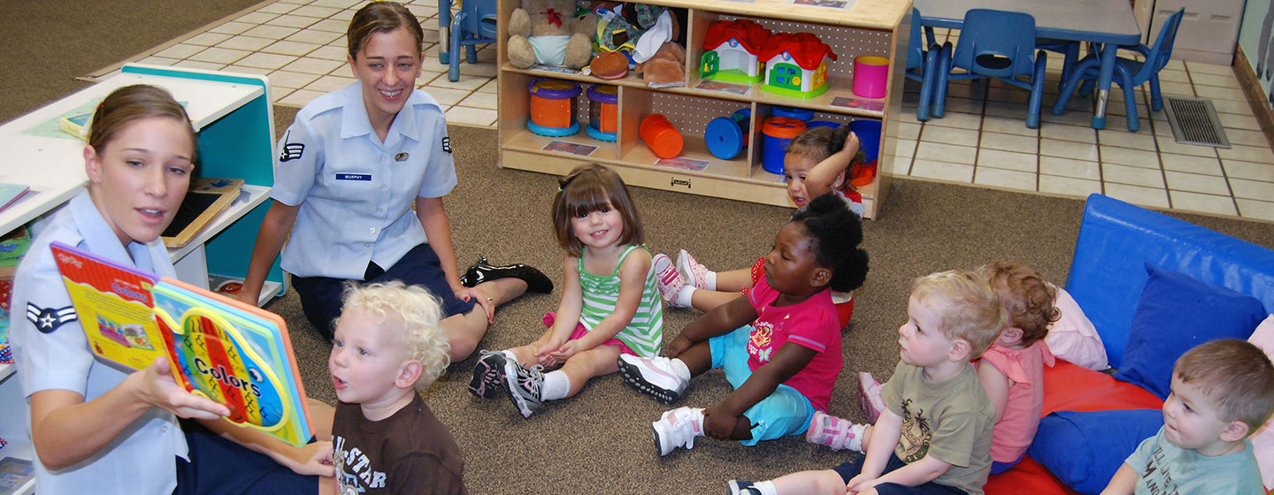 JAGs reading to small children