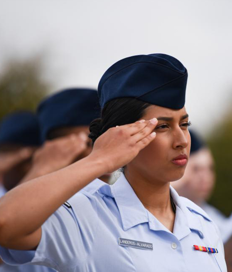 female airman saluting