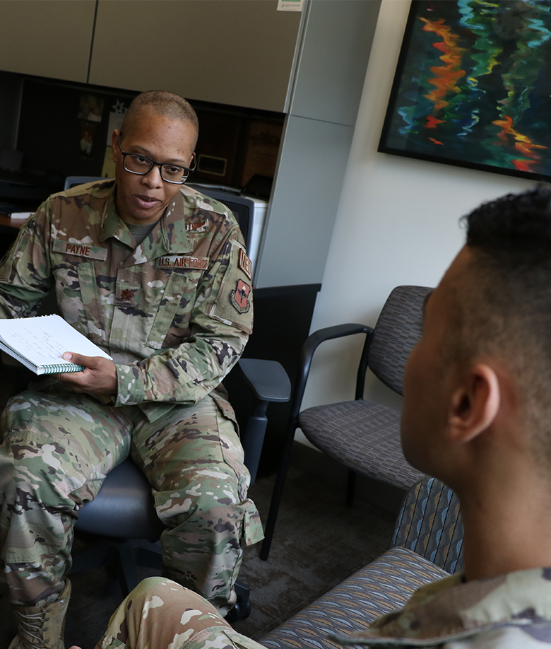 psychiatrist talking to a patient