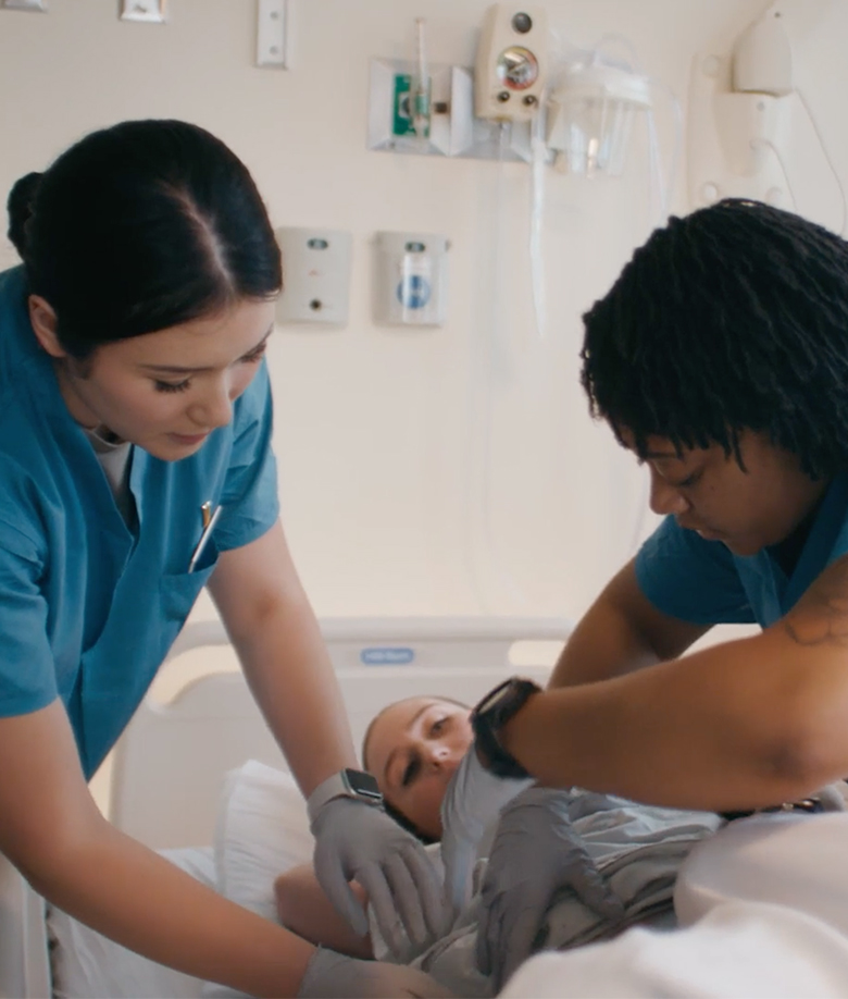 MIDWIFE CONDUCTING TRAINING