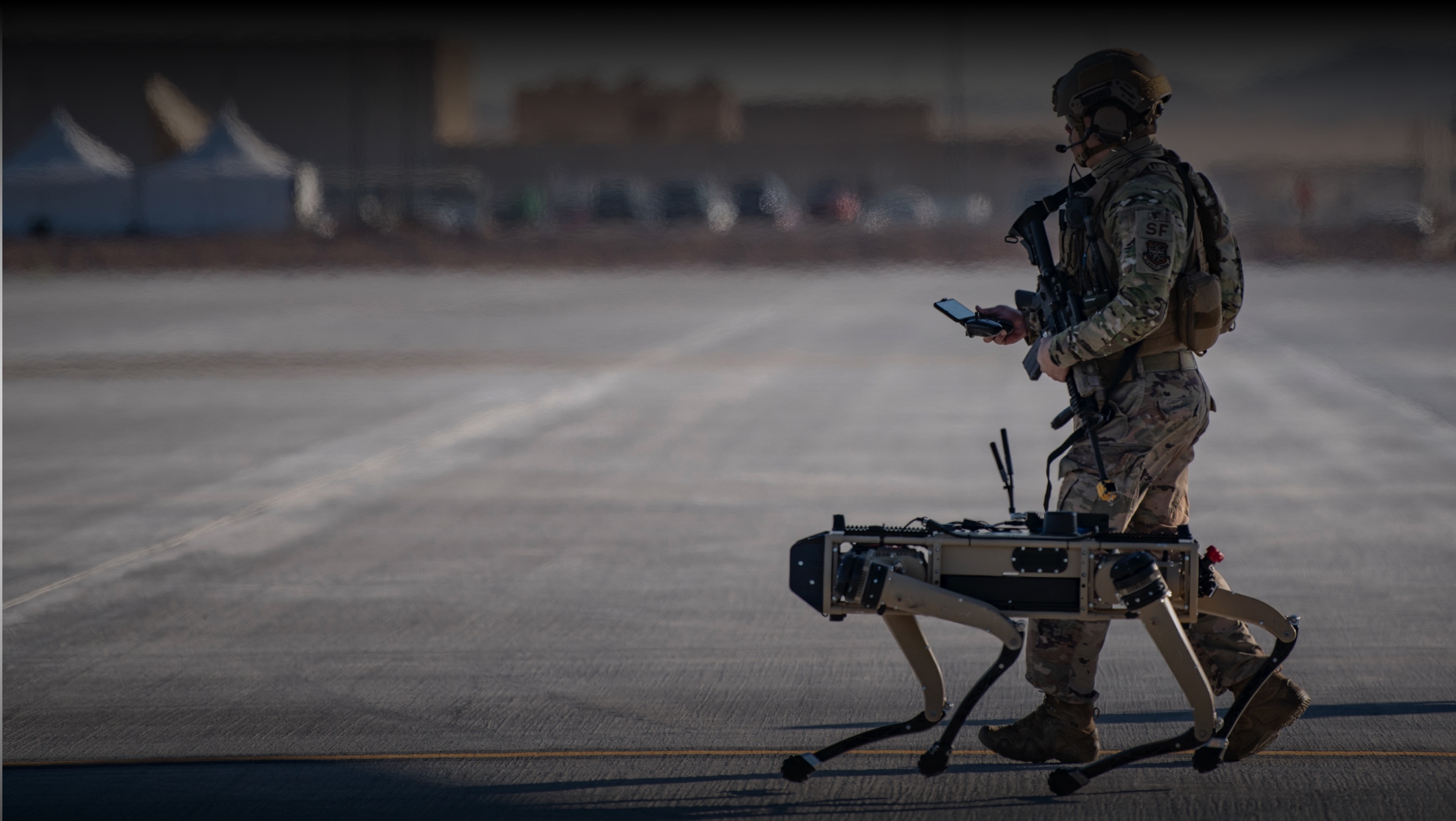 Airman with robotic dog