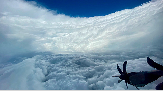 view of storm clouds outside of an aircraft
