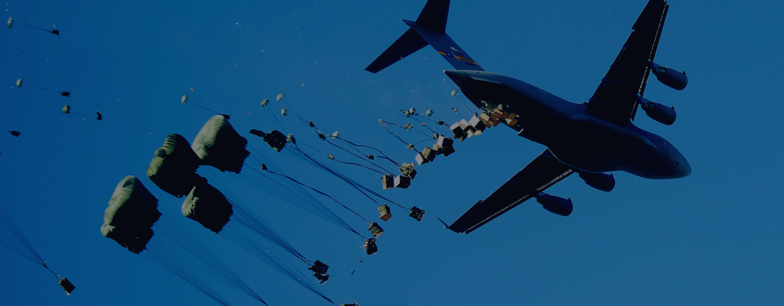 Air Force plane dropping humanitarian packages