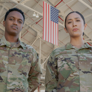 Male and female Airmen posing