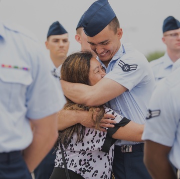 Young Airman hugging his mother
