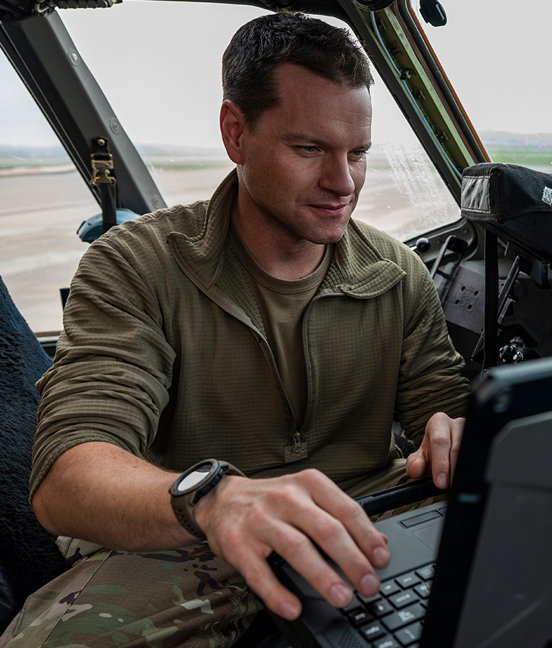 airman typing on keyboard