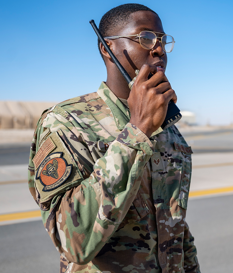 airman speaking into radio