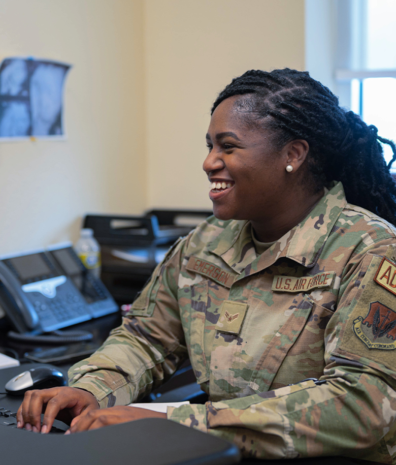 airman typing on keyboard