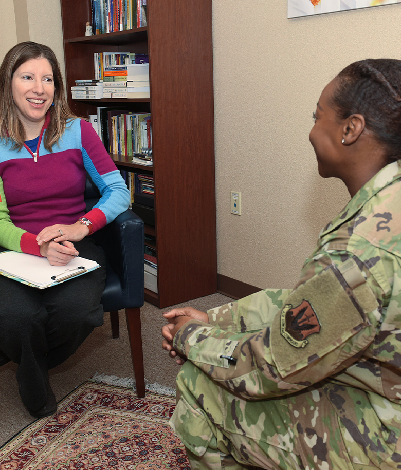 nurse practitioner talking to a patient