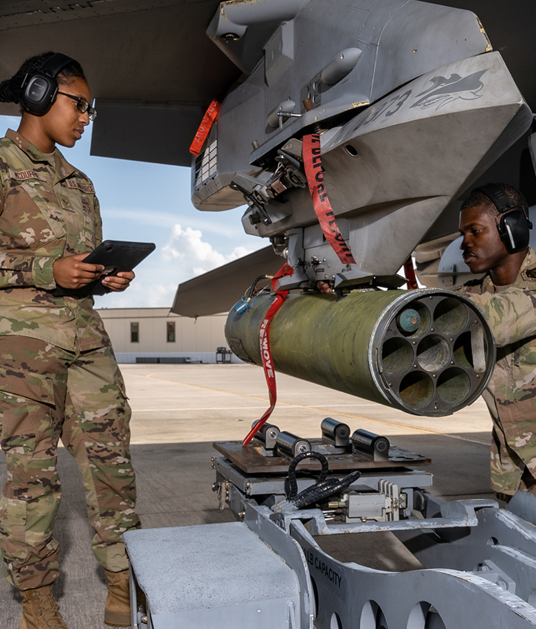 airmen working on aircraft