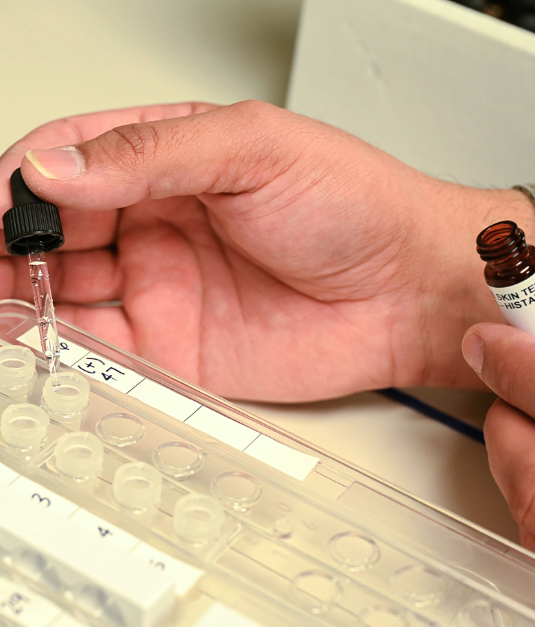 allergist conducting allergen testing