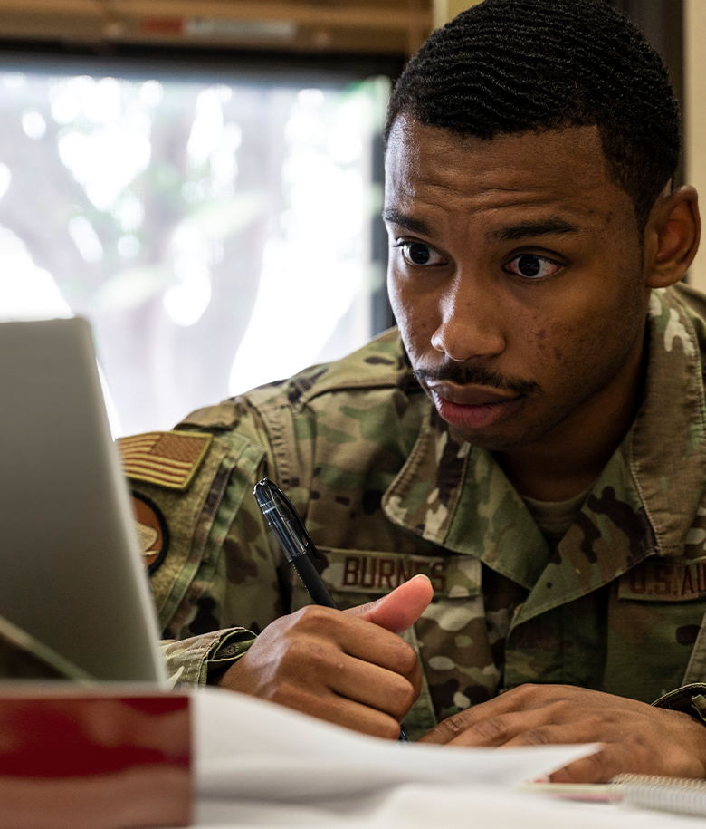 airman looking at laptop