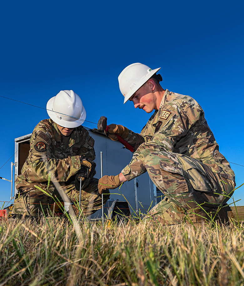 two airmen working on electrical systems