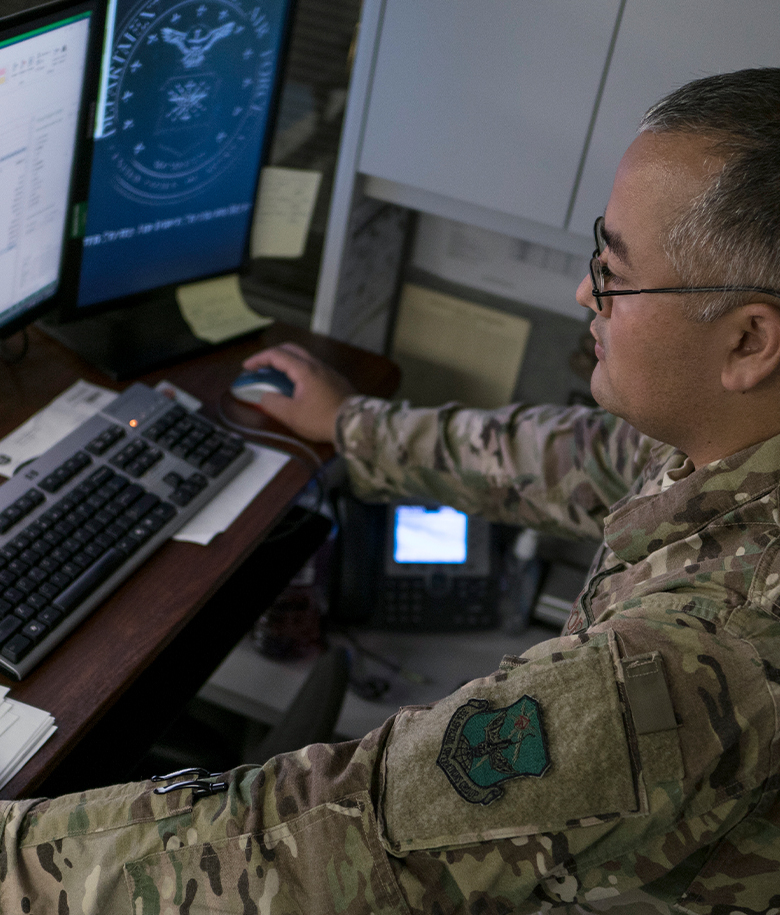 airman using desktop computer