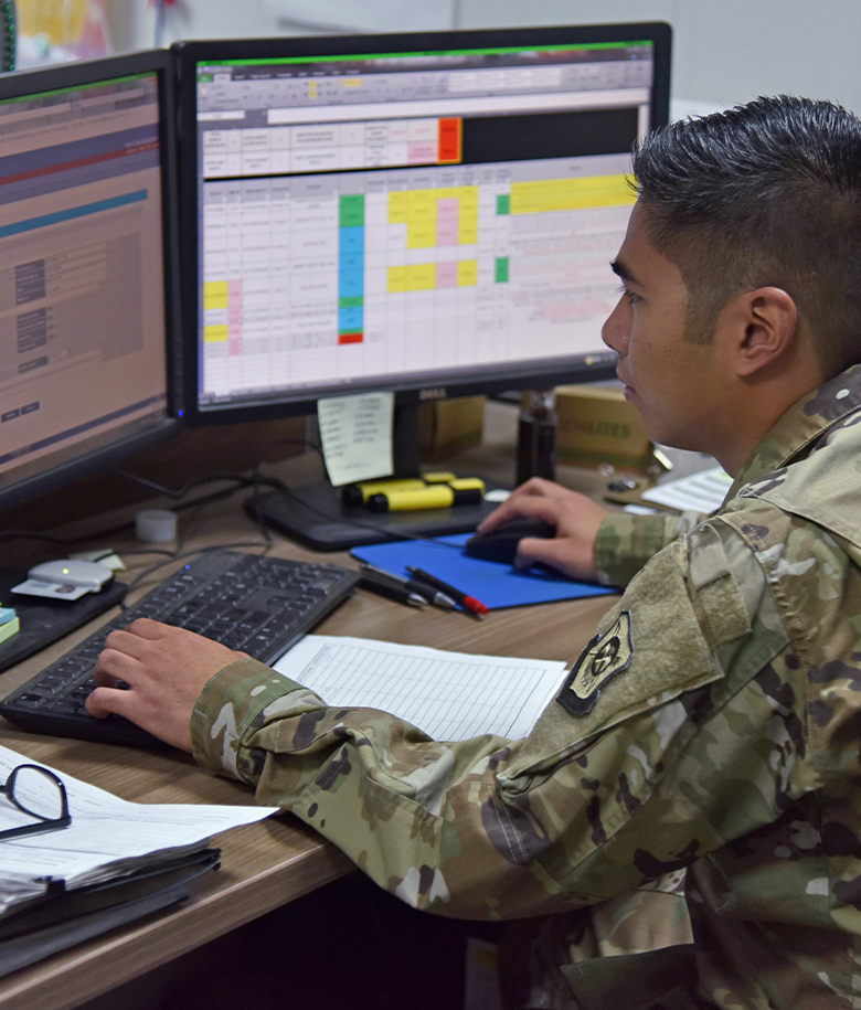 airman using desktop computer