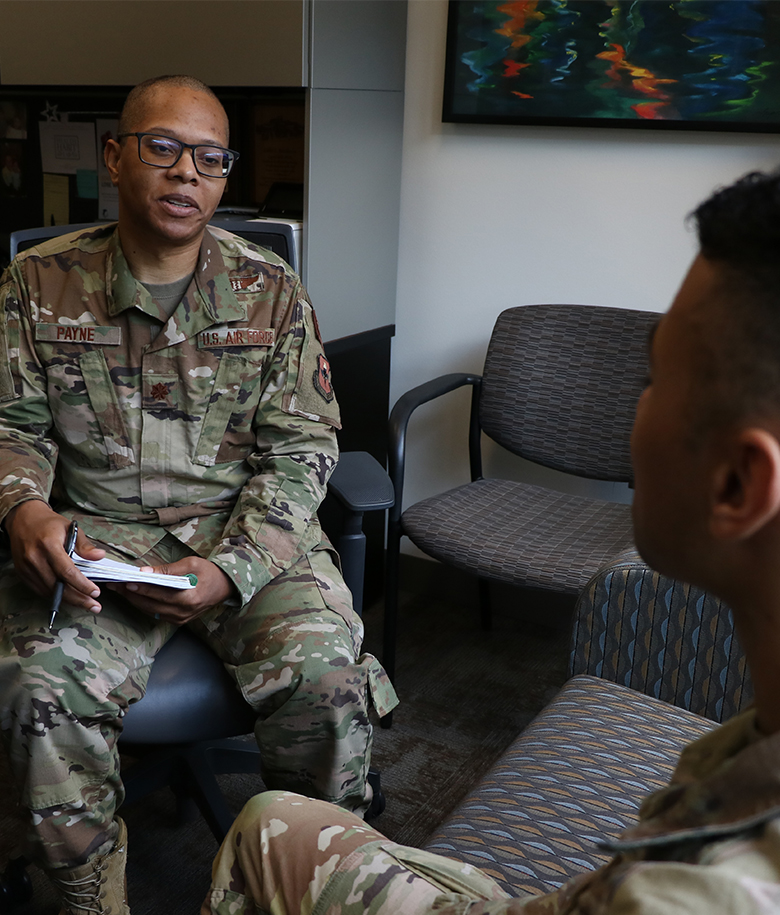 mental health service airman talking to a patient