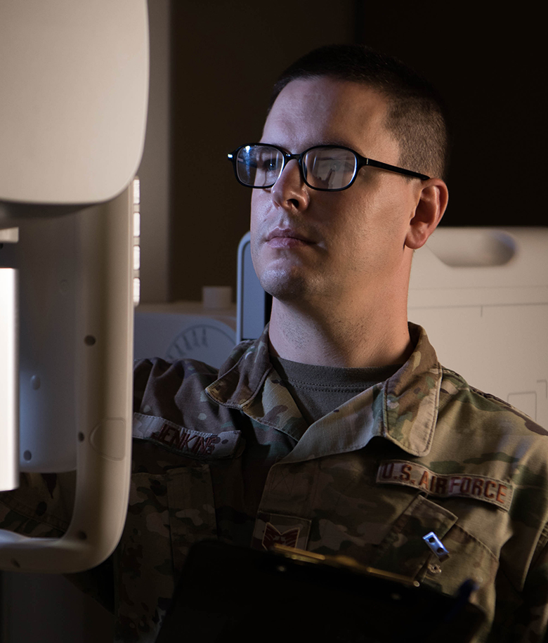 physician in front of a computer screen