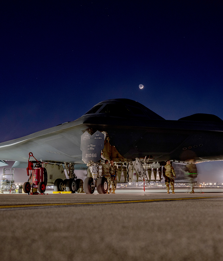 airmen repairing aircraft structure