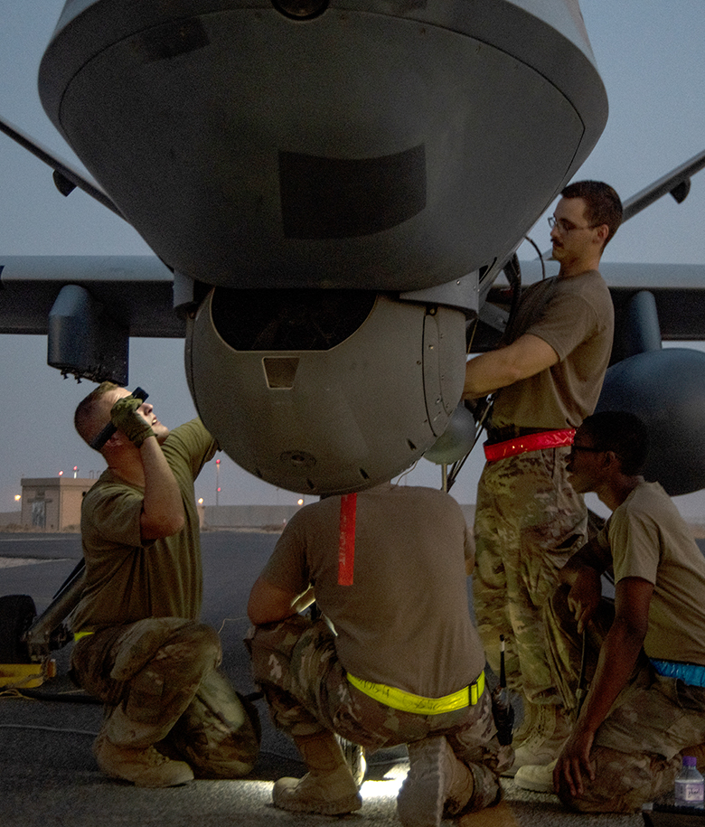 airmen performing maintenance on the RPA
