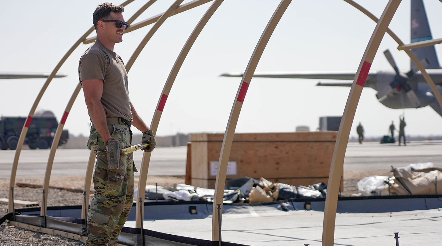 airmen with a sledgehammer