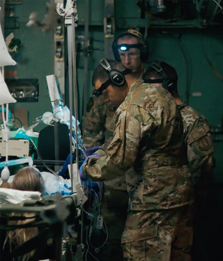 critical care nurses working with a patient