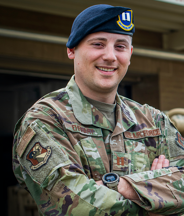 security forces officer smiling towards the camera