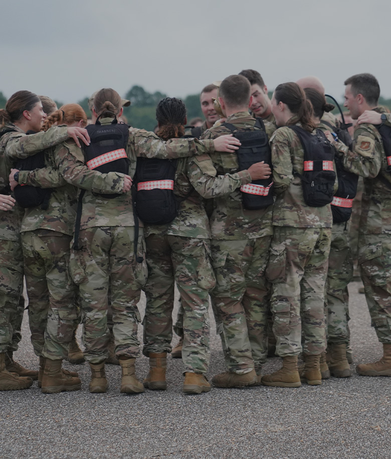 TRAINEES HUDDLE TOGETHER
