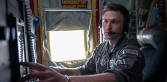 Airman in headset in aircraft