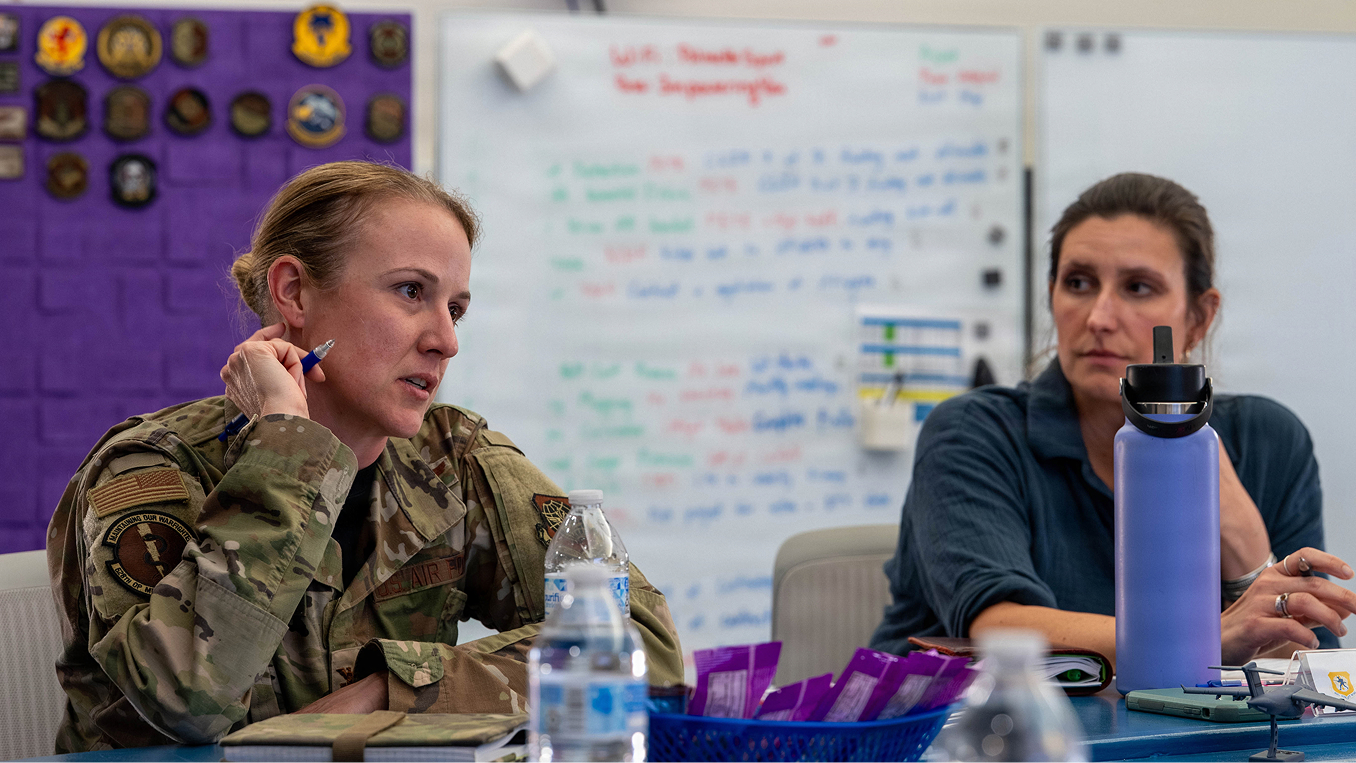 airman sitting at table