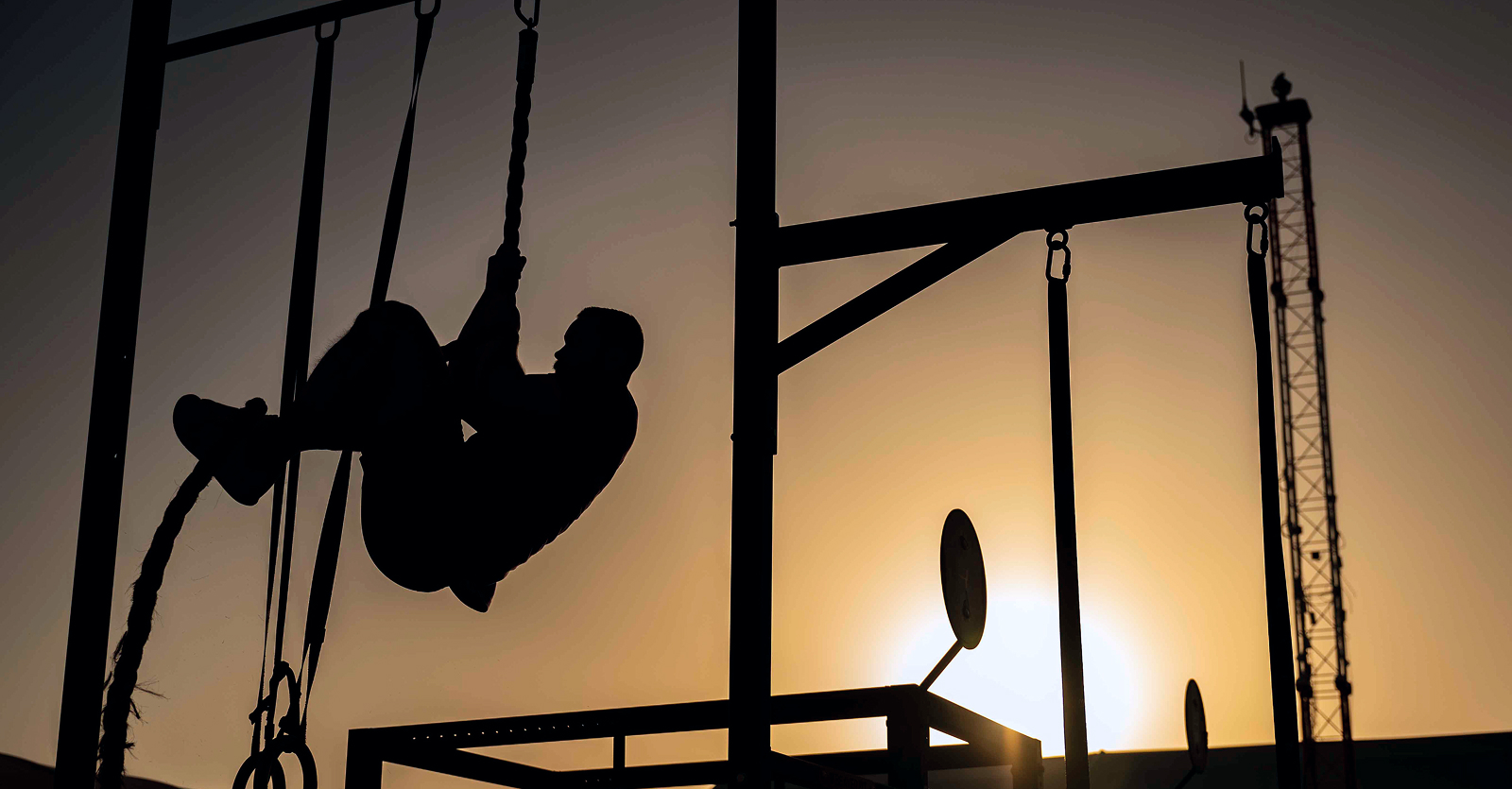 airman climbing rope