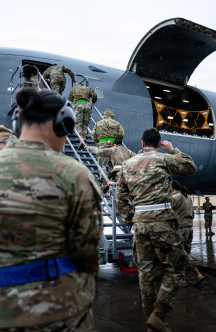 Airman boarding plane