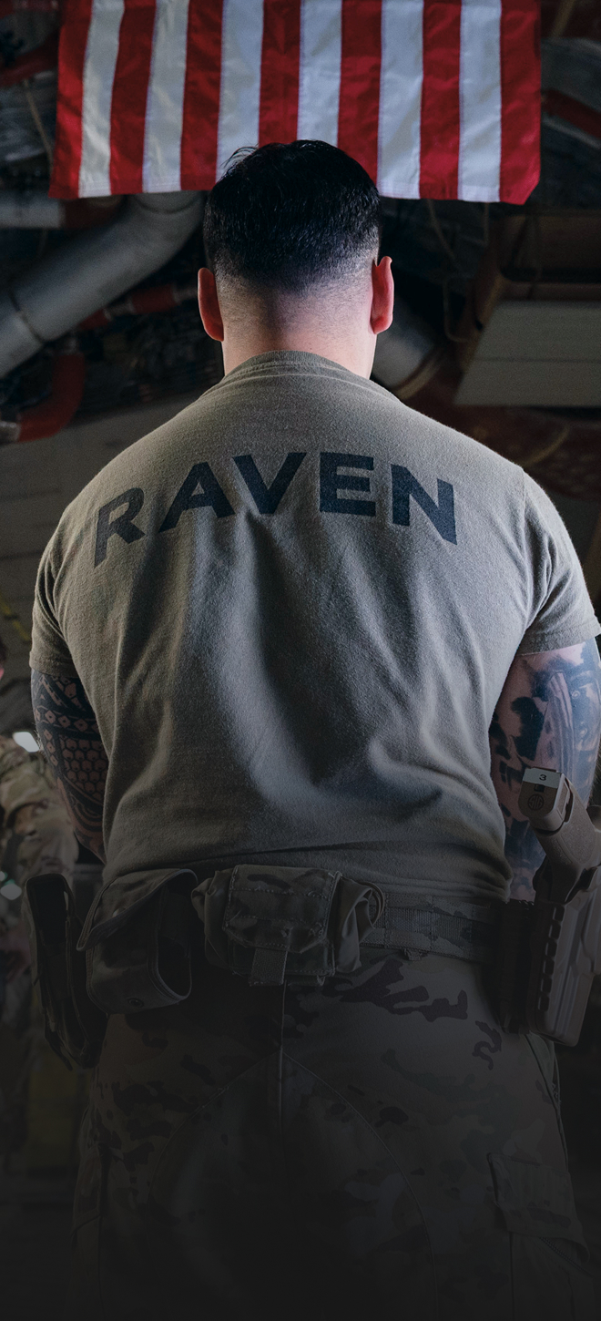 airman wearing raven shirt