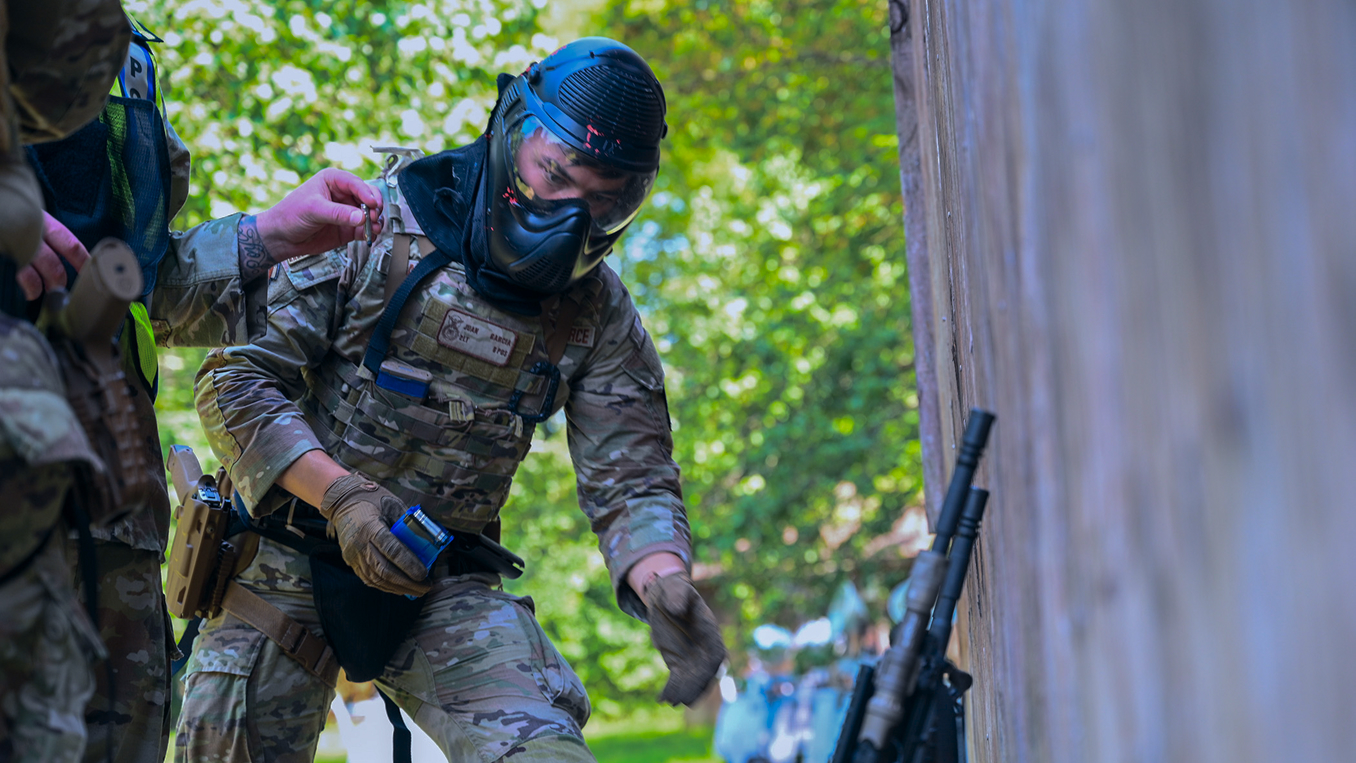 airman wearing protective mask