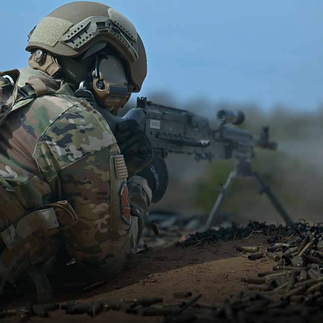 airman shooting machine gun