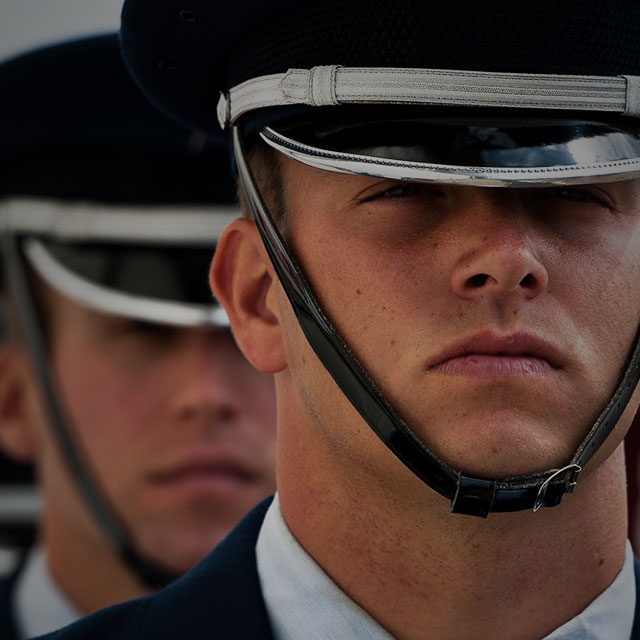 Airmen standing at attention in closeup