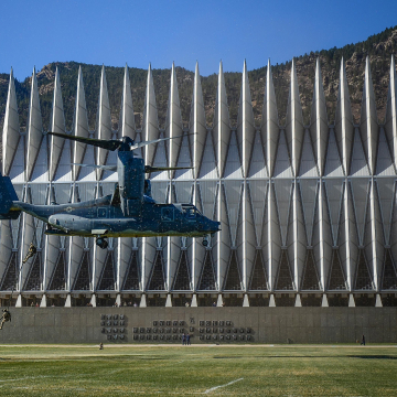 Air National Guard helicopter flying next to the Air Force Academy