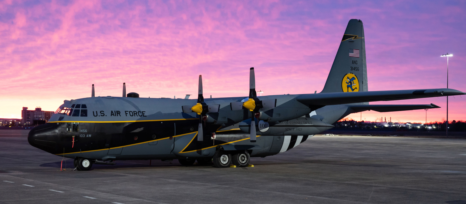 Air National Guard plane on a Connecticut airfield at sunset