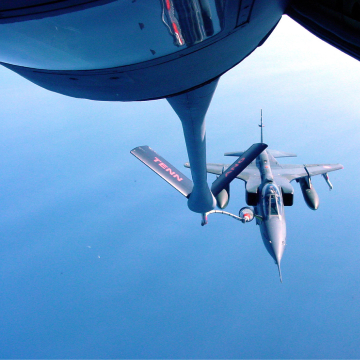 Air National Guard jet being refueled midair