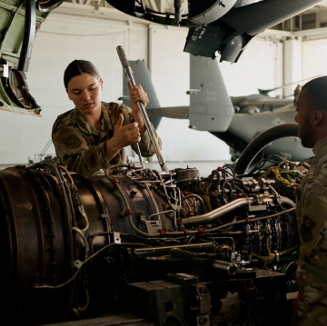 Male and female Airmen posing