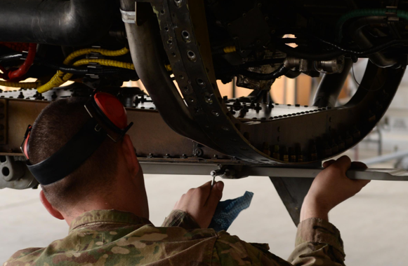 Airman maintaining a plane