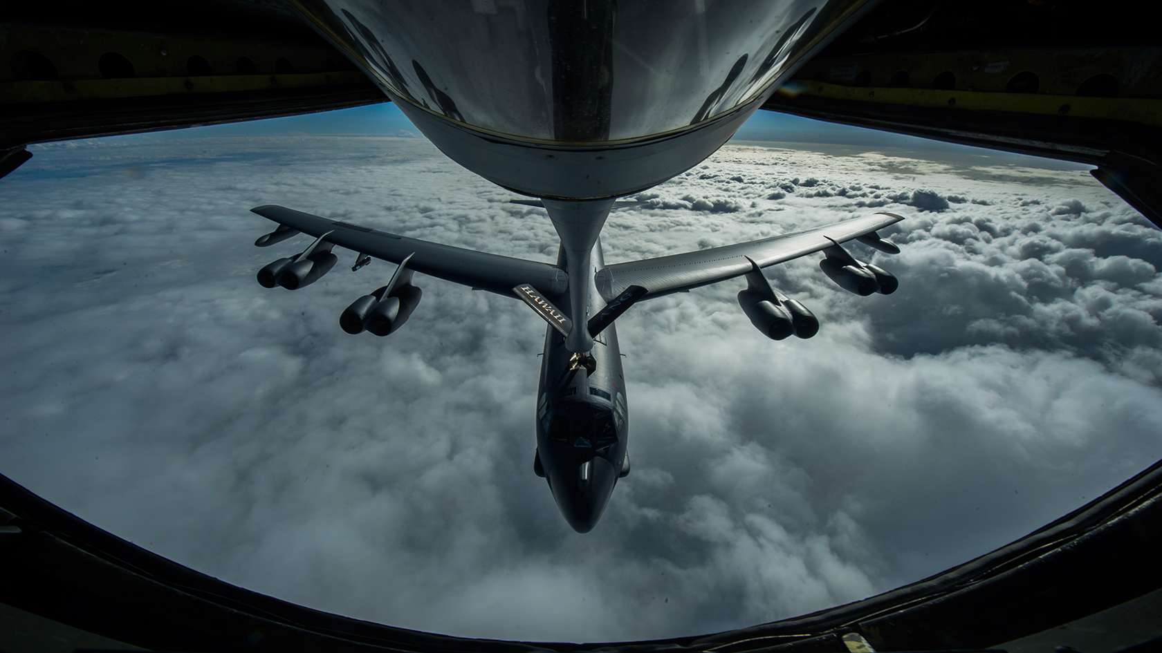 plane being refueled in the air