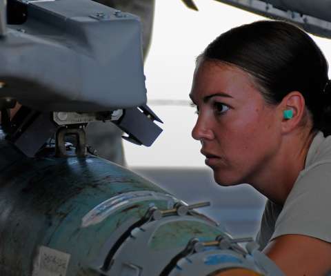 airman working on munitions