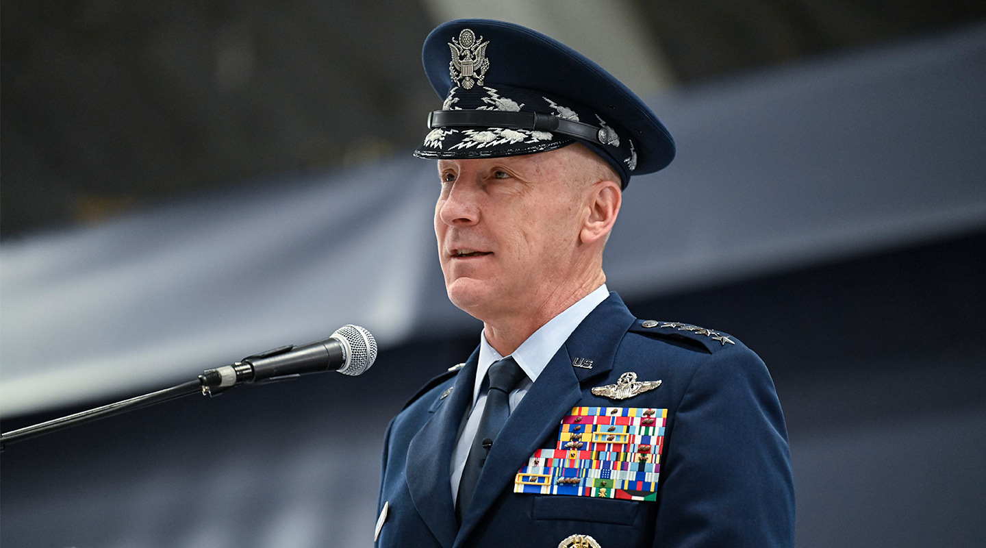 Gen Allvin speaking in front of a mic